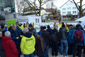 Plakat am BUND Stand Windenergie vs. Atomenergie, Thomas Egner